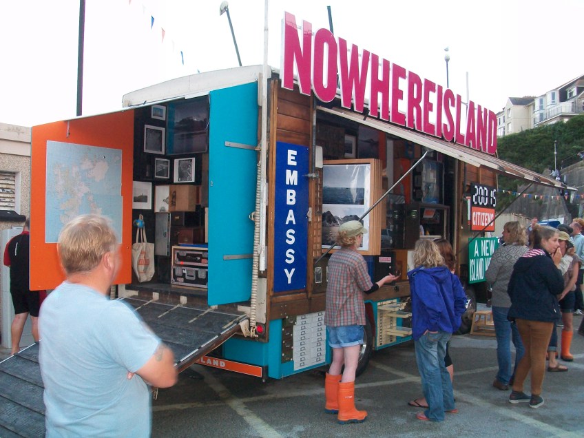 Figure 0.19: Alex Hartley, The Mobile Cabinet of Curiosities and Embassy of Nowhereisland, stationed in Newquay Harbor, Cornwall, United Kingdom, 2012, mixed media. Photograph: Joel Robinson.