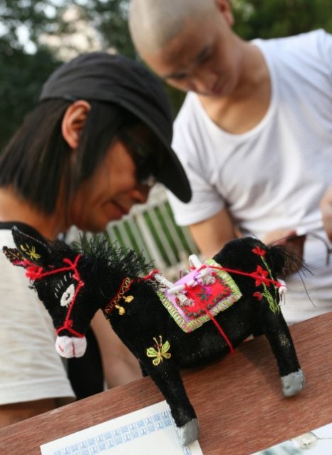 Figure 13.2: Michael Yuen and Yam Lau at one of DICA presentations. Courtesy of the artists.