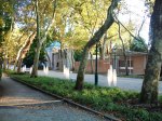Figure 3.2: Viale Trento, or the secondary avenue of the Giardini, looking southeast, and showing (from right to left) the Swiss, Venezuelan and Russian pavilions. Photograph: Joel Robinson.