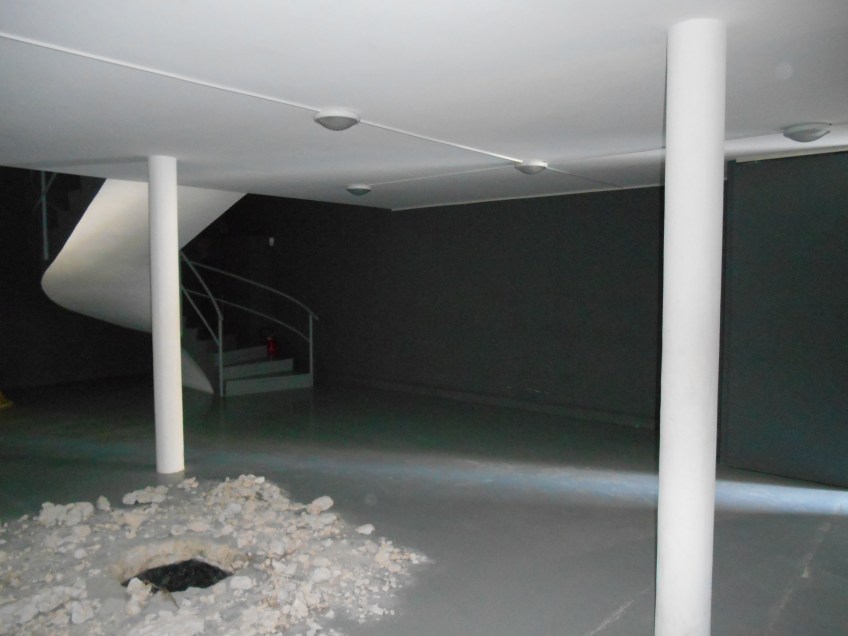 Figure 3.21: Interior view of the Israeli pavilion, with part of a site-specific installation in the foreground called The Workshop (2013) by Gilad Ratman. Photograph: Joel Robinson.